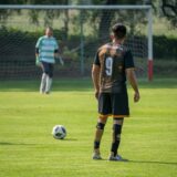 Why First Kickers Tend to Win Soccer Penalty Shootouts
